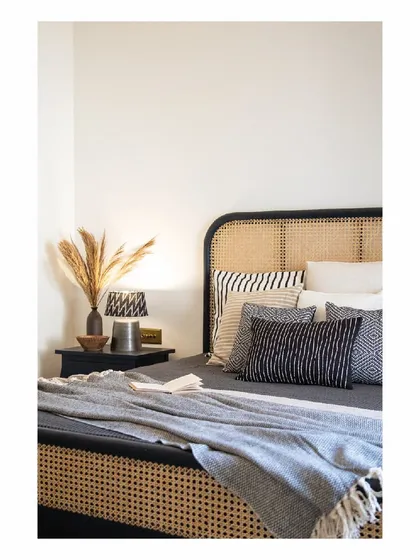 Holiday beds should feel like a sigh of relief. This bed in our Goa project features a beautiful black and cane frame, dressed in simple, textured linens. It’s a perfect example of how we use natural materials to create a relaxed and inviting bedroom.