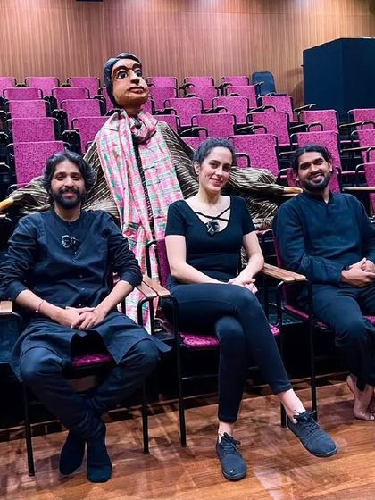 Our 'Buried Treasures' ensemble with the large Mritunjoy puppet at the Nita Mukesh Ambani Cultural Centre. Each artist brings a unique skill, from singing and composing to acting and puppeteering.
