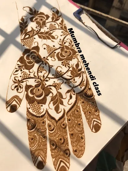 A gorgeous, full-hand design on a practice sheet. Never give up on your art!