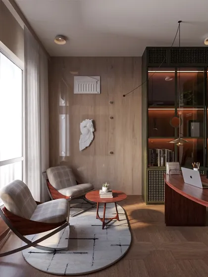 This angle shows the relationship between the main desk area and the separate reading nook, creating a multi-functional study.