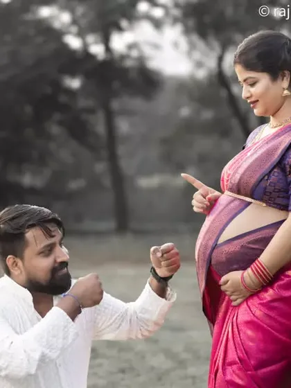 A playful interaction between the couple during a traditional saree maternity shoot. I believe in capturing the fun and laughter that is part of your unique story.