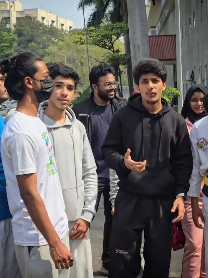 A candid shot of me talking to my students, emphasizing the importance of communication and mentorship.
