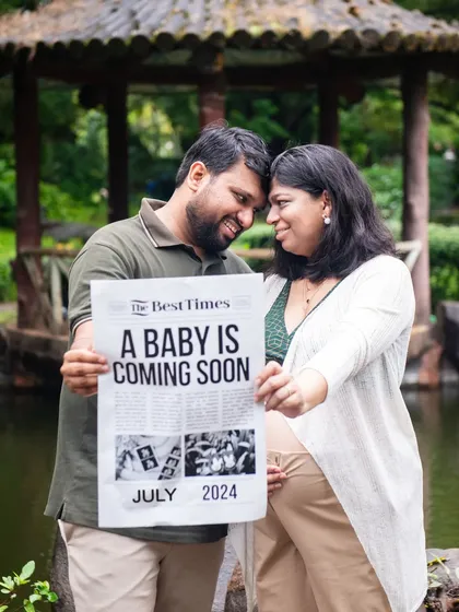 "Extra, extra, read all about it!" This couple used a custom newspaper prop to announce their baby's upcoming arrival in a fun and unique way.