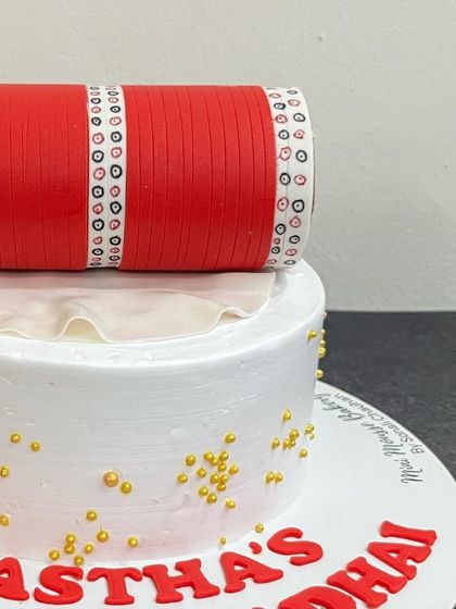 A close-up of a custom bridal-themed cake. We are planning to organize a workshop focused on wedding and bridal theme fondant cakes like this one.