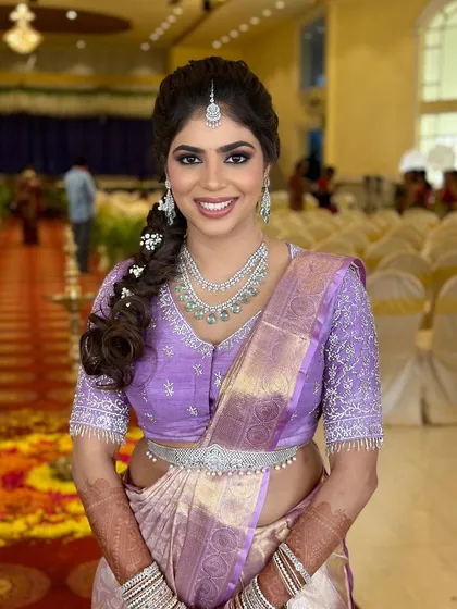 A radiant, smiling portrait from the engagement ceremony.