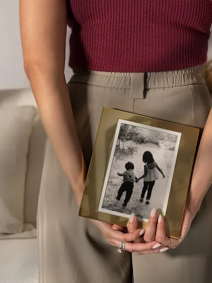 Some memories deserve more than just a place in your heart, they deserve a beautiful frame. This simple, elegant brass frame is perfect for showcasing a treasured black and white photograph.