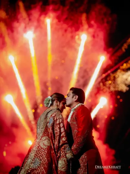 Amidst a sky full of brilliant fireworks, we captured this quiet, intimate moment for the couple. It’s this blend of grandeur and genuine emotion that we strive to create, crafting endings that feel more like beautiful beginnings.