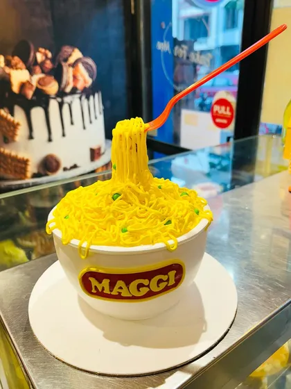 Can you believe this bowl of Maggi is actually a cake? I love creating these fun, hyper-realistic cakes that trick the eye and delight the taste buds. Every noodle and vegetable is carefully crafted from fondant.