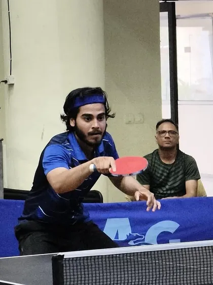 An intense moment of focus from a player during a match at the Indian Table Tennis League.