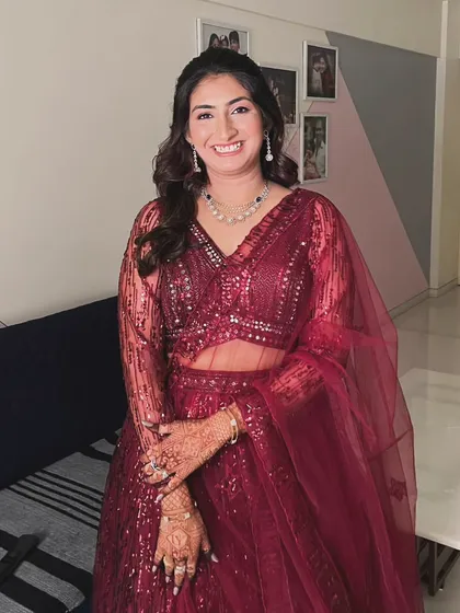 The full look for this engagement ceremony. The makeup is designed to be timeless, ensuring her photos will be cherished for years to come.