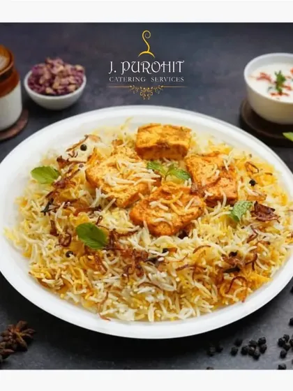 This is my signature Paneer Tikka Biryani, a dish that showcases the heart of my Indian menu. It features fragrant basmati rice, marinated paneer, and crispy fried onions, plated to look as good as it tastes.