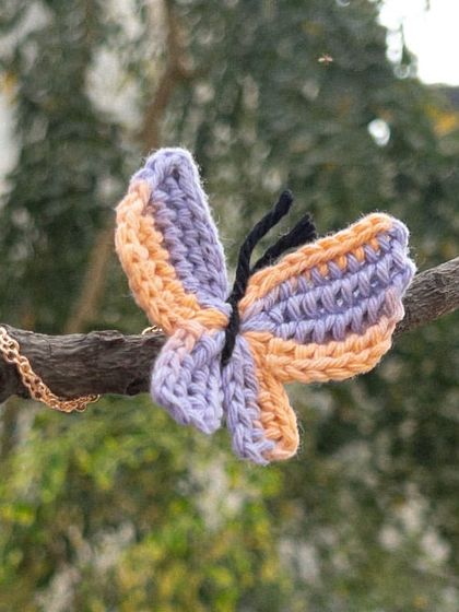 The 'Titli' necklace in a dreamy peach and lilac. This is such a soft and pretty color combination.