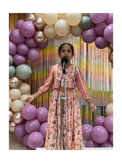 A student performs her solo piece, demonstrating the emotional range and depth she has learned to express.