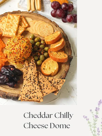 Our Cheddar Chilli Cheese Dome. A perfect choice for those who love a bit of spice, this cheese dome is coated in a vibrant chili mix.