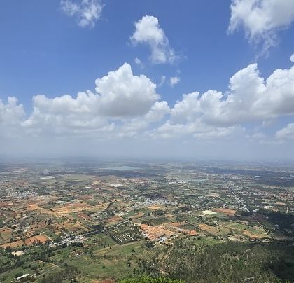 The stunning panoramic view from a viewpoint near the Adiyogi statue, part of our one-day trip.