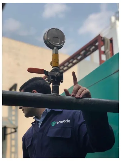 An engineer inspects a pressure gauge on a newly installed gas line. This focus on safety and quality control is paramount in every project I undertake, ensuring the system operates within precise parameters.