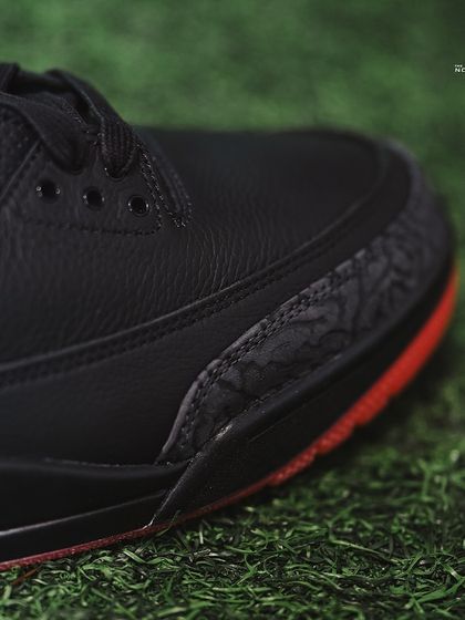 A macro shot of the classic elephant print overlay on the toe of the Jordan 3 J Balvin 'Rio'.