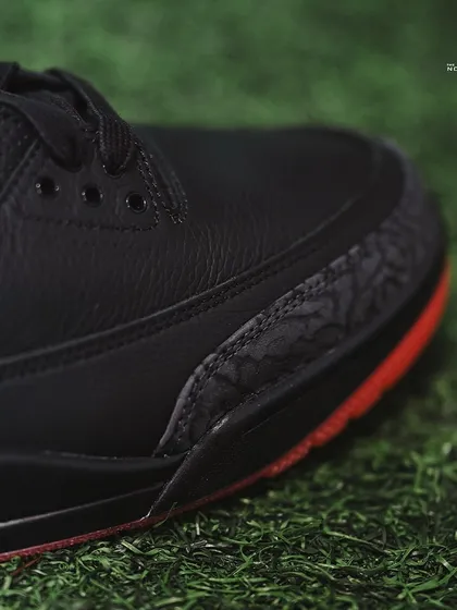 A macro shot of the classic elephant print overlay on the toe of the Jordan 3 J Balvin 'Rio'.