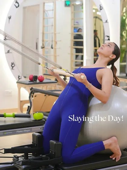 Always in my element. This kneeling stretch on the reformer with the stability ball is perfect for improving posture and core strength.
