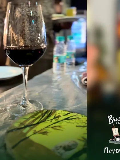 A glass of wine next to a freshly painted wood slice. Some of our workshops are perfect for a relaxed "sip and paint" evening.