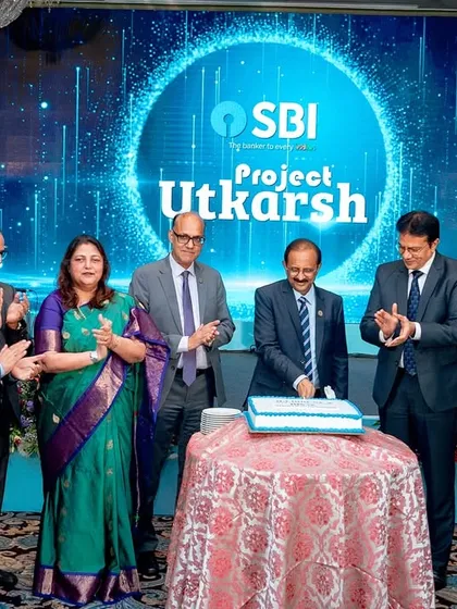 On stage for a milestone moment with State Bank of India for their 'Project Utkarsh' launch. I have extensive experience hosting for leading brands in the banking and finance sector.
