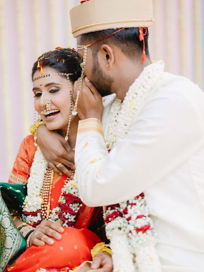 A whispered secret and a shared laugh. This candid moment between Vicky and Aishwarya is intimate and playful, one of the small, unscripted memories that make a wedding day special.