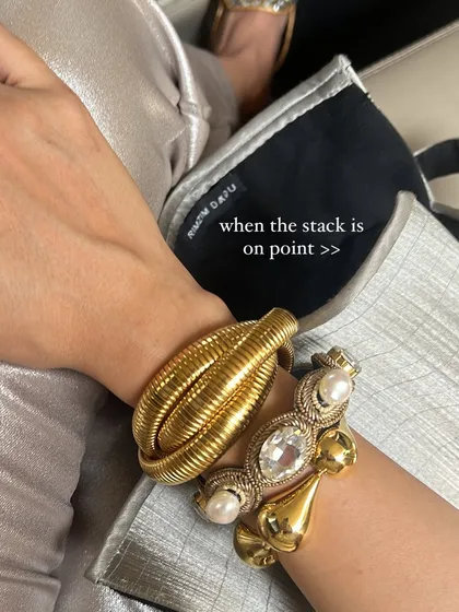 A perfect bracelet stack can make you feel so put together. Here, I've mixed different metals, textures, and styles to create a look that is both bold and personal. This is a small detail that makes a big impact.