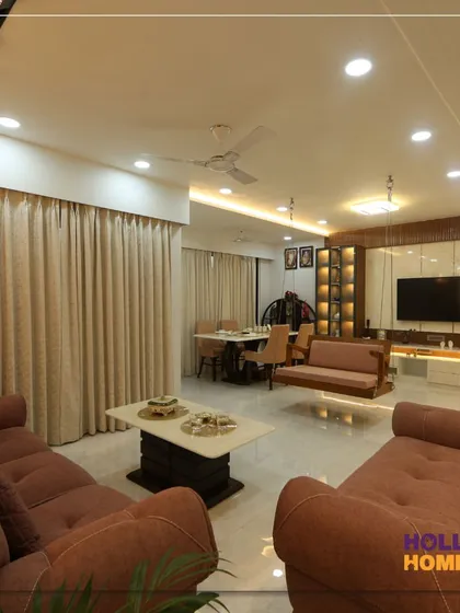 Another perspective of the living room, highlighting the spacious layout that accommodates both a seating area and the traditional swing. The design ensures the room feels open and uncluttered.