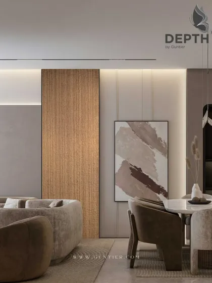 Here, a textured veneer panel serves as a visual divider between the living and dining areas. It adds a layer of sophistication and helps to define the open-plan space.