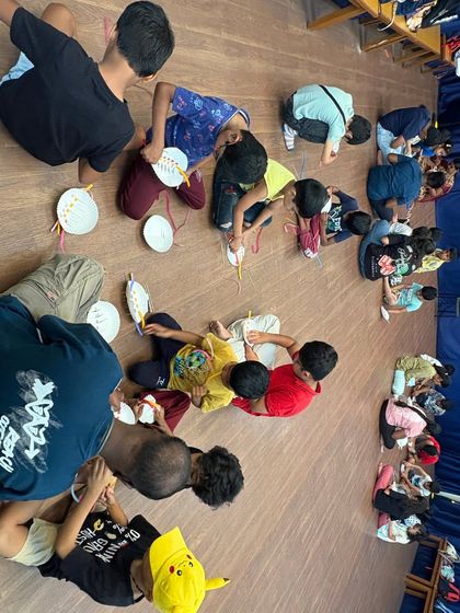 A candid shot of our little artists working on their creations. It's wonderful to see their focus and the pride they take in their work.