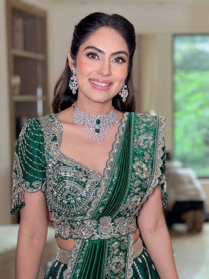 A beautiful close-up portrait of the bride. Her skin is glowing, and her eyes are softly defined.