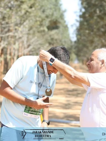 The ultimate prize. Runners from our various events proudly display their finisher medals, a tangible reminder of their strength, endurance, and accomplishment.