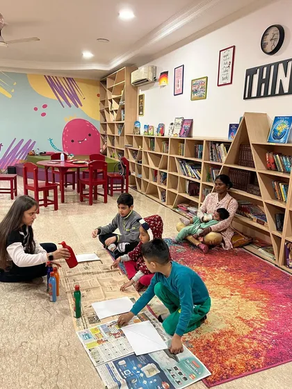 Our winter camp activities sometimes spill onto the floor. I lay down newspaper so the kids can paint freely and express themselves without any worry about making a mess.