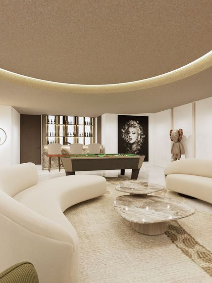 This entertainment room concept features a curved ceiling, a pool table, and a well-stocked bar. The space is designed for leisure and socializing, with iconic art and collectible figures adding a touch of personality and modern flair.