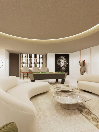 This entertainment room concept features a curved ceiling, a pool table, and a well-stocked bar. The space is designed for leisure and socializing, with iconic art and collectible figures adding a touch of personality and modern flair.