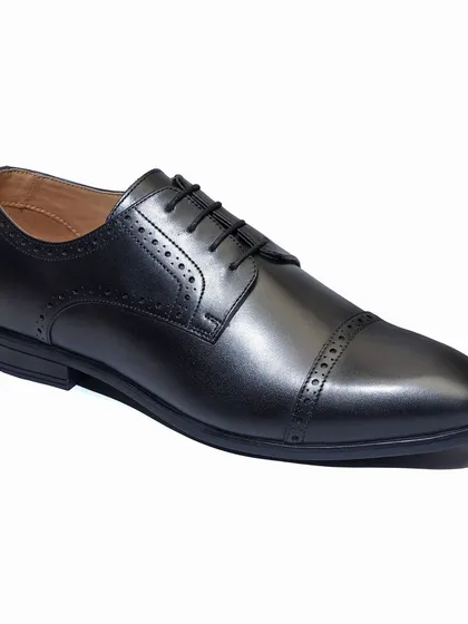 A perfect, clean shot of a formal leather shoe, isolated on a white background. This is the gold standard for e-commerce product listings on platforms like Amazon and Flipkart, ensuring your product looks sharp and professional.