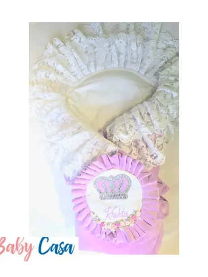 A personalized wrap for a little princess named Khalsa. The design features a sparkling crown on a soft lavender base with a frilly white lace border, fit for royalty.