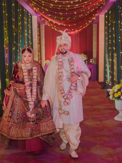 The couple walking hand-in-hand. A beautiful start to their new journey together.