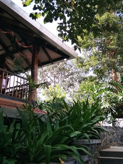 The veranda of the PLENTI House in the Nilgiris, a space for volunteers to relax and enjoy the view of the surrounding tea gardens.