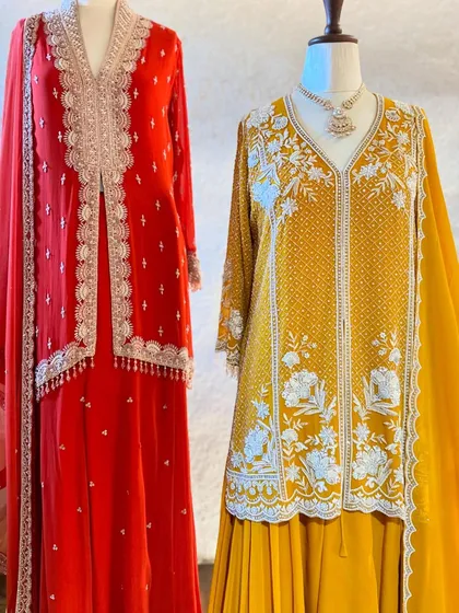 This red and mustard yellow combination is a festive classic. The layered kurta and embroidered jacket offer a sophisticated look for any celebration.