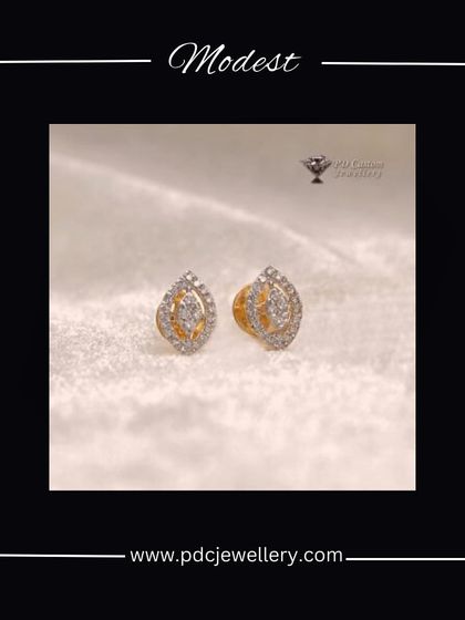 Modest yet beautiful, these 18kt hallmarked gold and diamond earrings feature a leaf-like or 'paan' shape, perfect for a touch of traditional elegance.