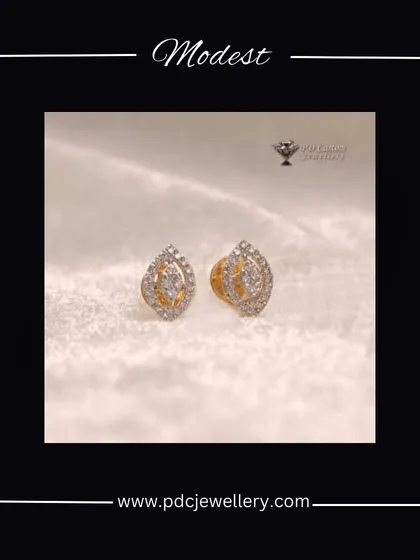 Modest yet beautiful, these 18kt gold and diamond earrings feature a delicate leaf-like design. They are perfect for adding a subtle touch of sparkle to your everyday wear.