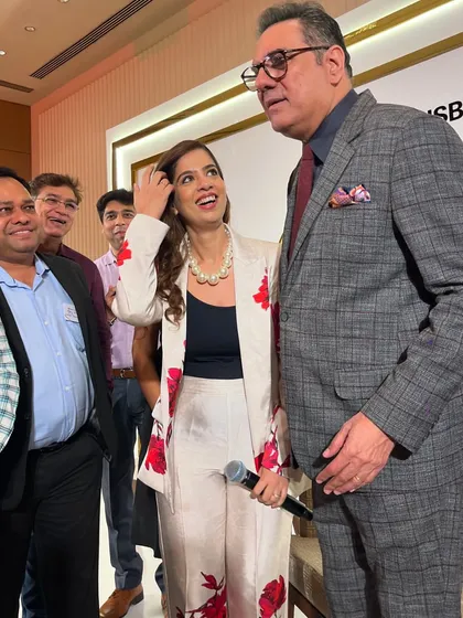 A candid moment of laughter with Boman Irani and guests. His compliment on my hosting and attire was a highlight of the evening.