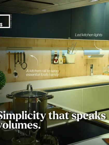 Simplicity that speaks volumes. This kitchen uses a combination of LED strip lights for tasks and a kitchen rail to keep essential tools handy.