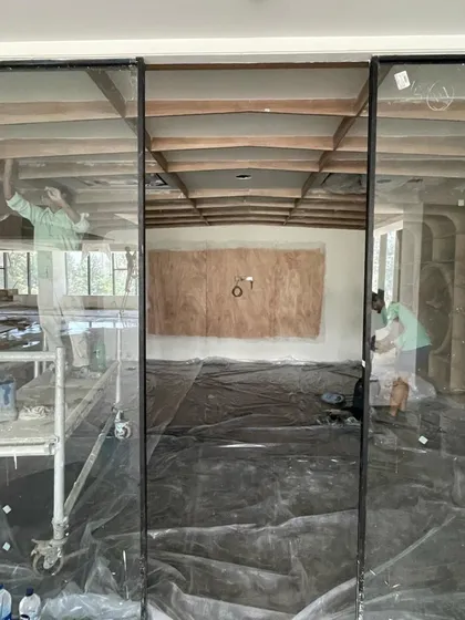 A work-in-progress shot from Heritage Xperiential School. This image shows the interior during construction, with scaffolding and exposed ceilings, offering a glimpse into the process of transforming a site into a learning environment.