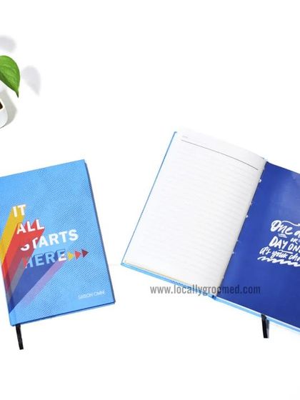 These custom diaries feature motivational quotes like "It all starts here" and "One day or day one. It's your choice." They are perfect for inspiring your team at the start of a new project or year.