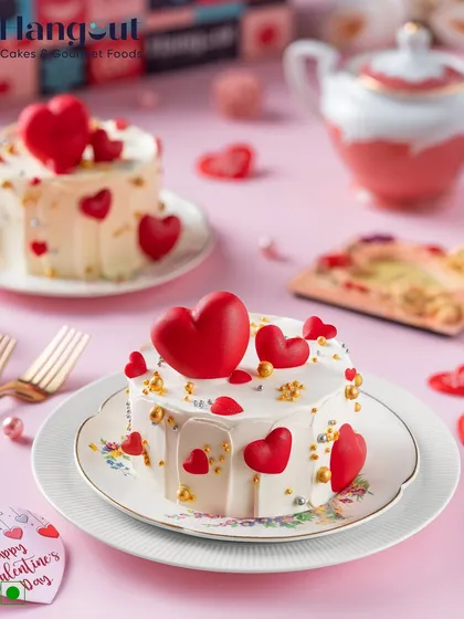 Made with layers of moist red velvet sponge and cream cheese frosting, this cake is decorated with intricate heart designs, specially curated for Valentine's Day.