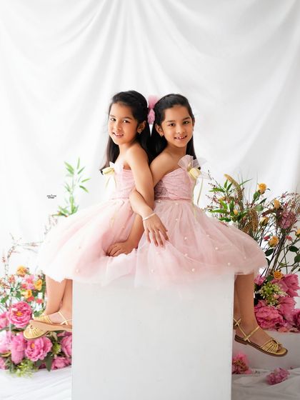 Back to back and full of smiles. These twin sisters were an absolute delight to photograph for their 7th birthday.