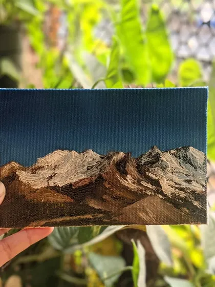 For this piece, I used a palette knife to create the sharp, snowy peaks of the mountains against a dark evening sky. It was a bit of a happy accident, but I love how the texture turned out. It gives the painting a rugged, natural feel.