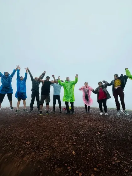 A jumping-for-joy moment at the top of a hill on our Kodachadri trek.